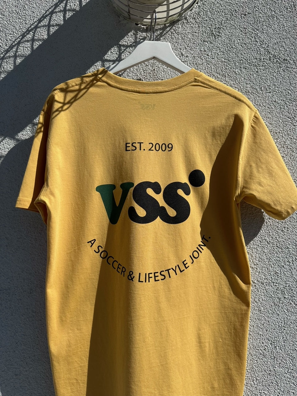 VSS: A Soccer & Lifestyle Joint. T-Shirt - Mustard